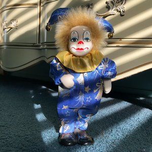 Porcelain clown/joker doll